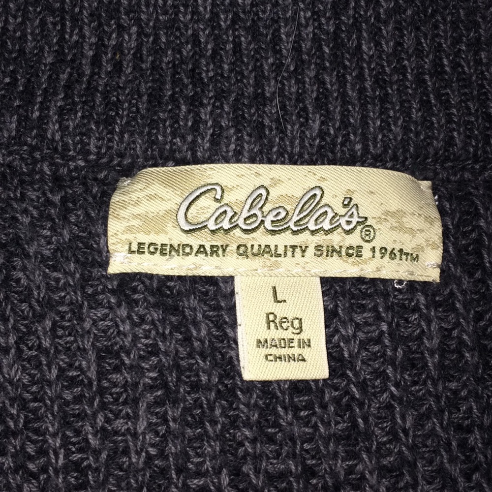 Cabela’s. Dark blue sweater vest
